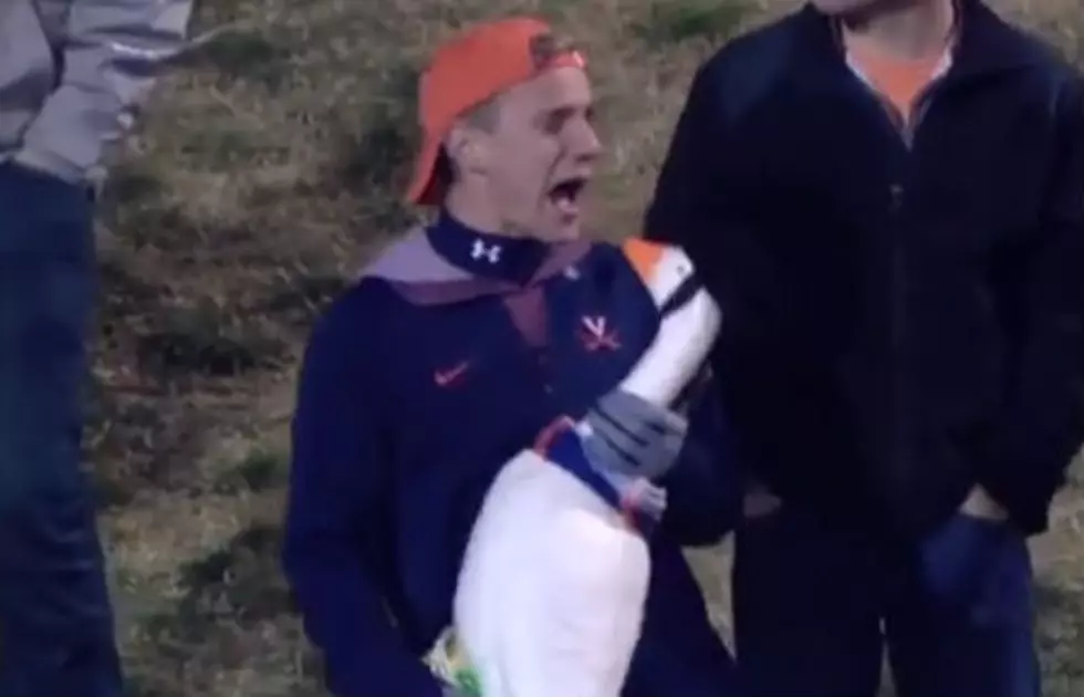TV Cameras Catch College Football Fan Singing Journey to Plastic Goose [VIDEO]