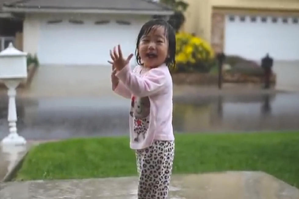 Little Girl Experiences Rain