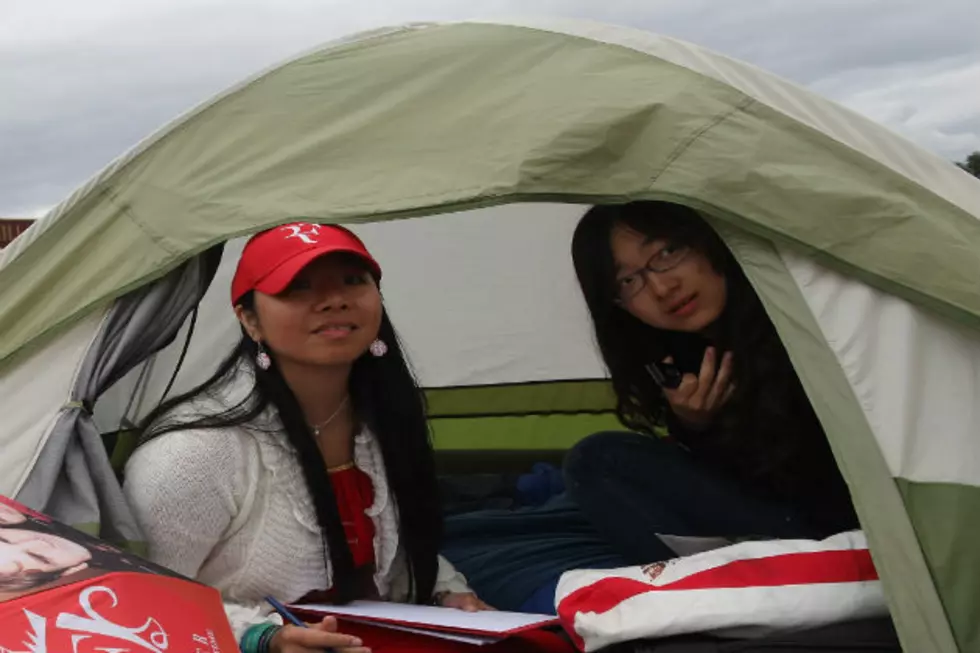 People Camped outside in the Freezing Temperatures for the Opening of Resturant in North Dakota