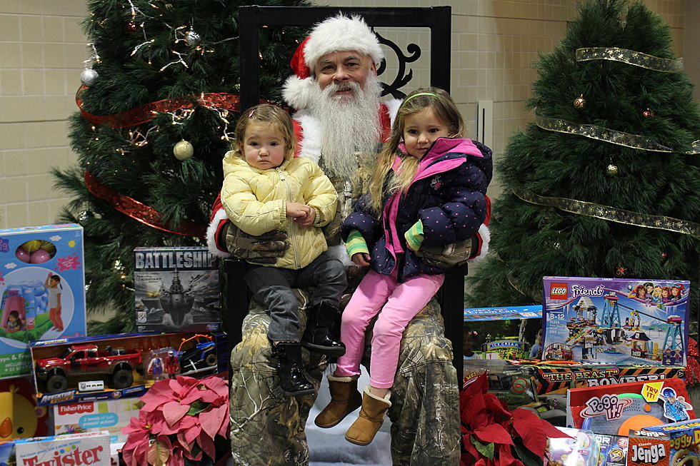 Download Your Camo Santa Photo from the 2017 Puklich Chevrolet ND Sportsman’s Expo