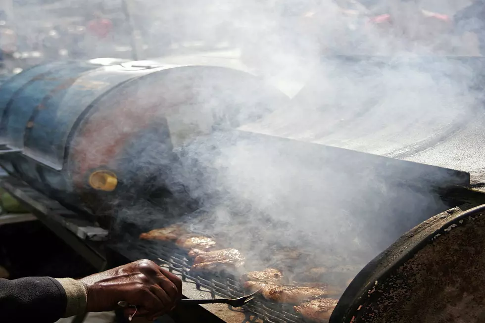 Man Steals Hot Meat From A Hot Smoker With His Bare Hands