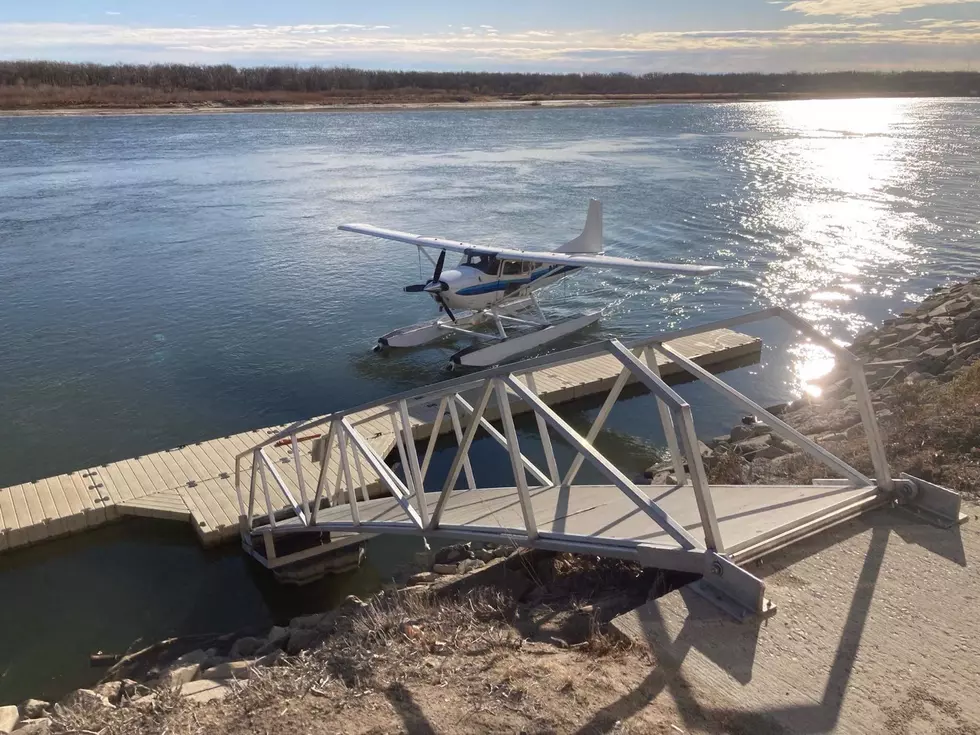 Local River Bar Had Air Plane Pull Up To Dock