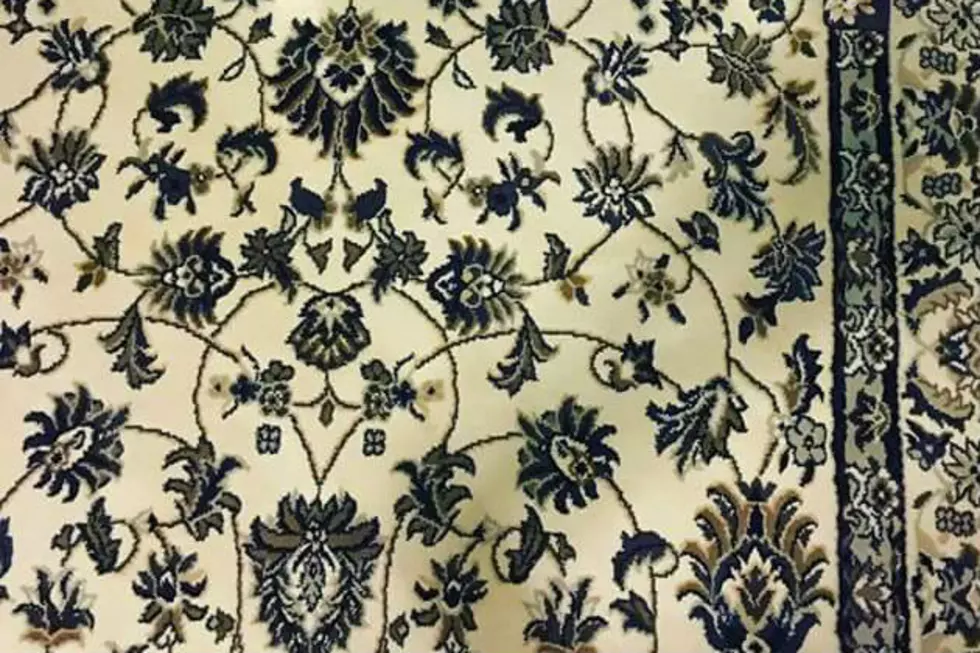Photo of Dropped Cell Phone on Rug will Drive You Insane