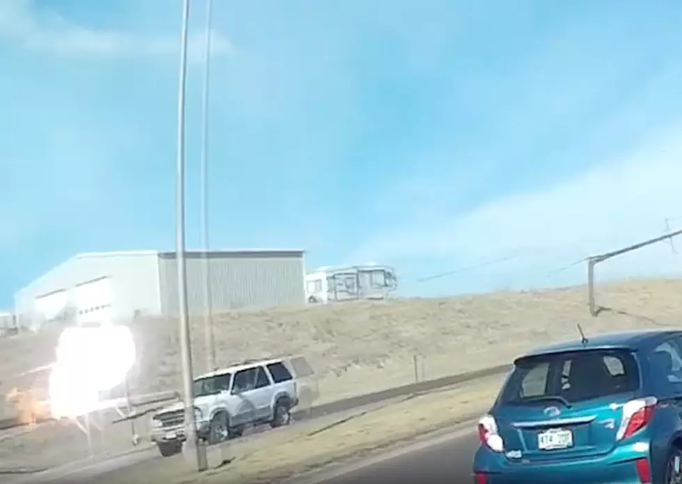 Watch the Video as a Downed Power Line Hits a Car