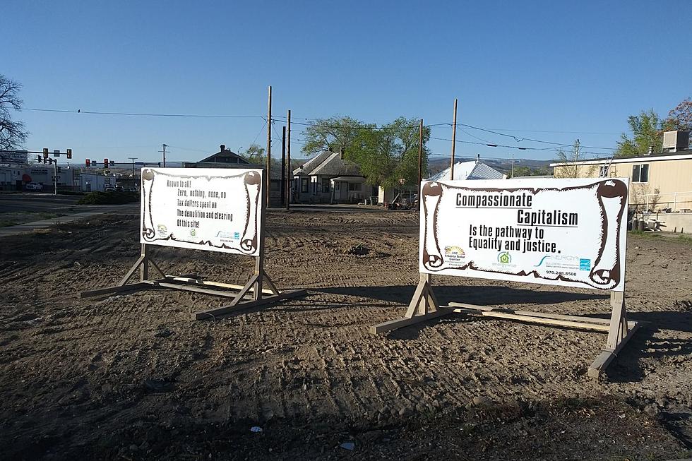Two Signs at 4th and Ute in Grand Junction – What Do They Say?
