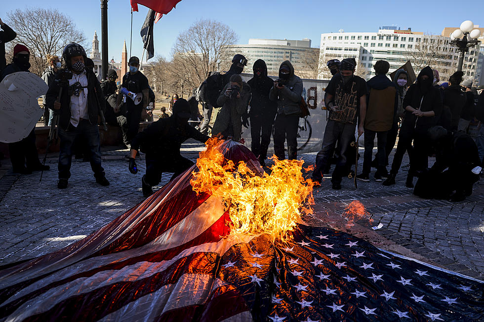 Demonstrators Burn American Flags Outside Colorado Capitol