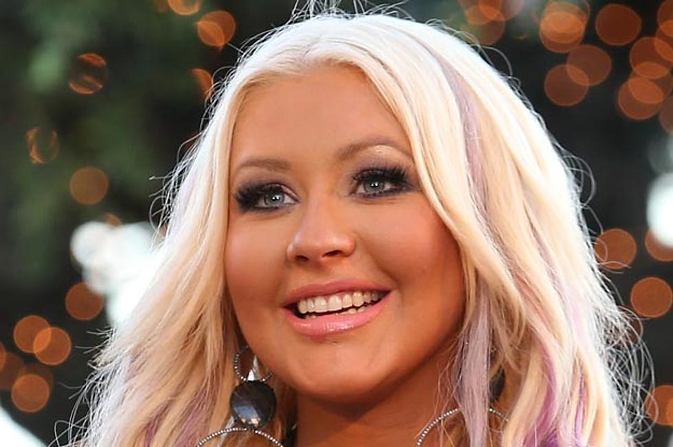 Christina Aguilera Gets Purple Streaks