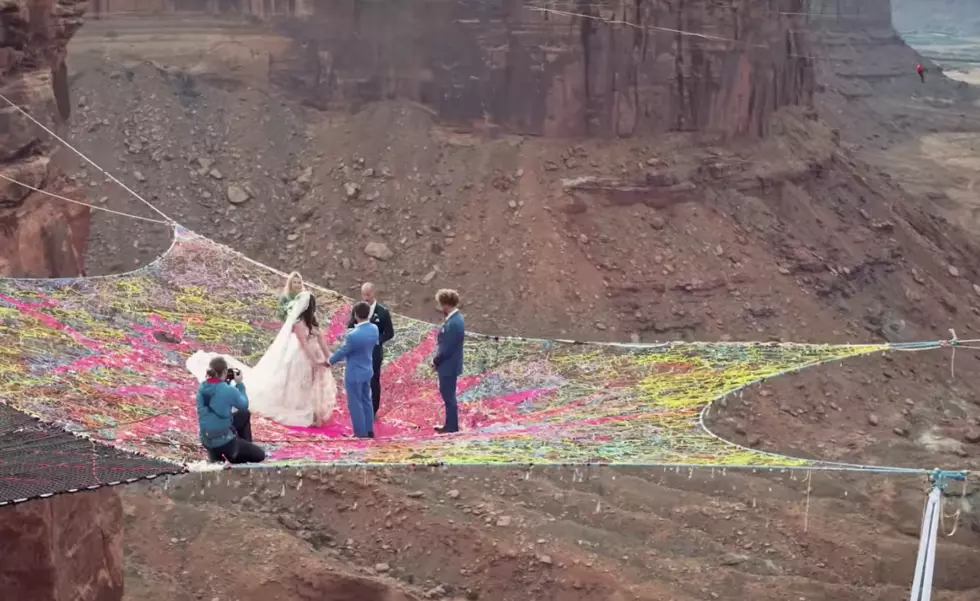 Daredevil Bride + Groom Get Married Above Moab Canyon