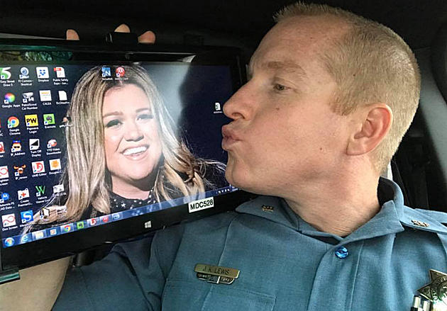 Kelly Clarkson Gives Colorado State Trooper Lewis Backstage Pass