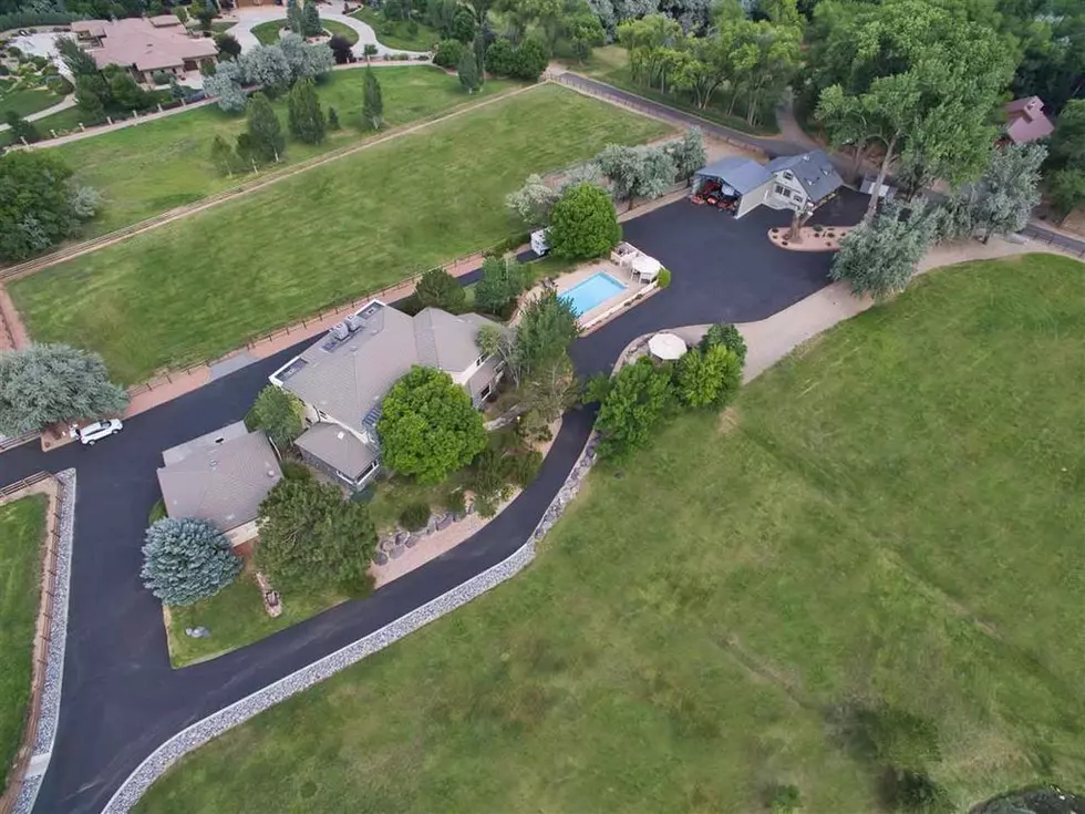 $1.9 M Grand Junction House Has Private Pond + Greenhouse + Shop