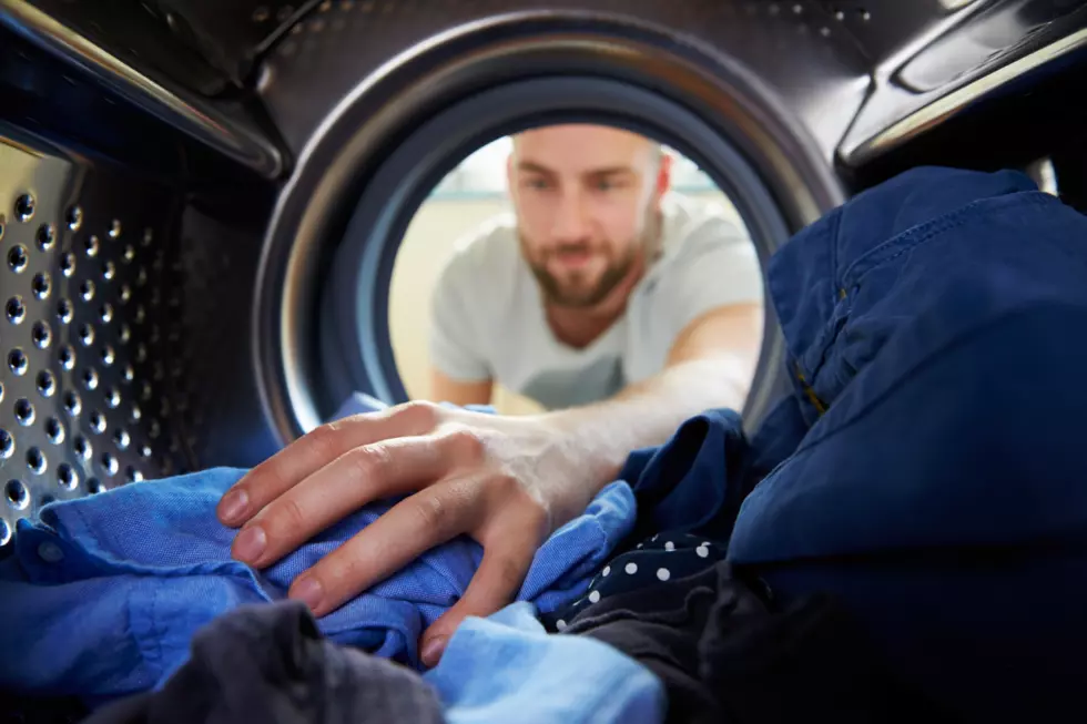 Washing Machine Donated to Colorado Veteran Doing Laundry in Sink