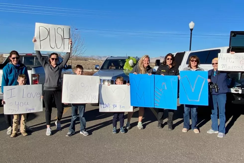 Group Cheers on Family Member in Labor Outside of GJ Hospital