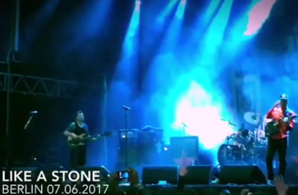 Audioslave Members Play A Song With A Light Shining Down On A Mic [Video]