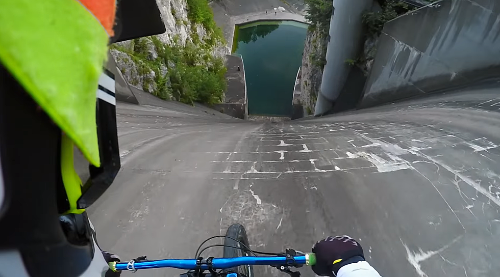 This Is What It’s Like To Ride Down A Vertical Dam Wall Into Water (VIDEO)