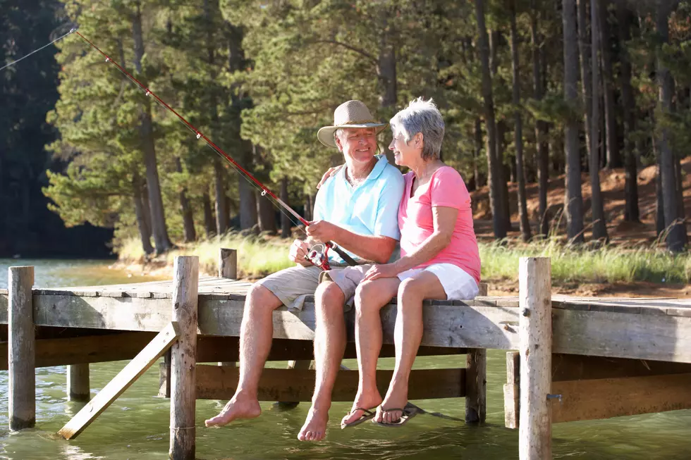 Colorado Couple Shows Off Their Lifetime Fishing Licenses