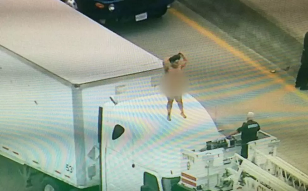 Naked Woman Spotted Dancing on Top of Semi on 290