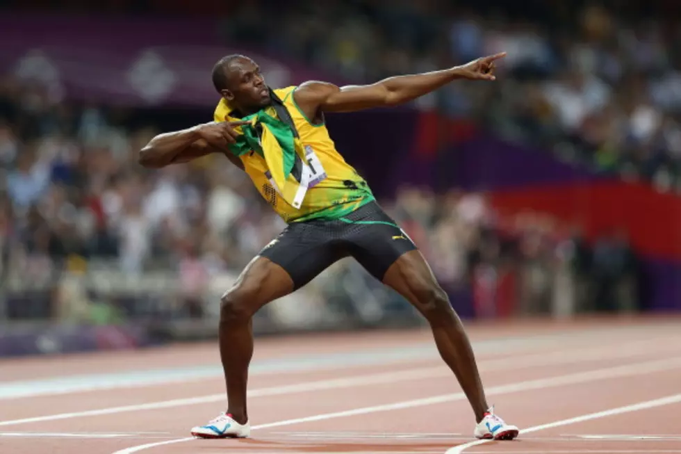 Bolt Runs Into History With Another Gold