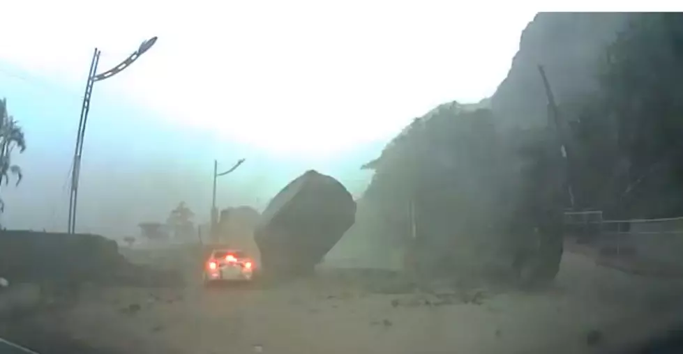 Taiwan Landslide With Big Boulder Crashes on Car [Video]