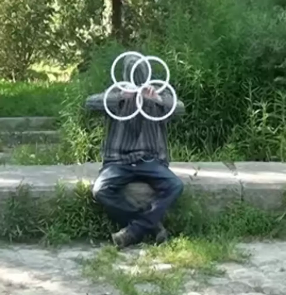 Blindfolded Performance Artist Lindzee Poi Will Freak You Out With Hoop Illusion