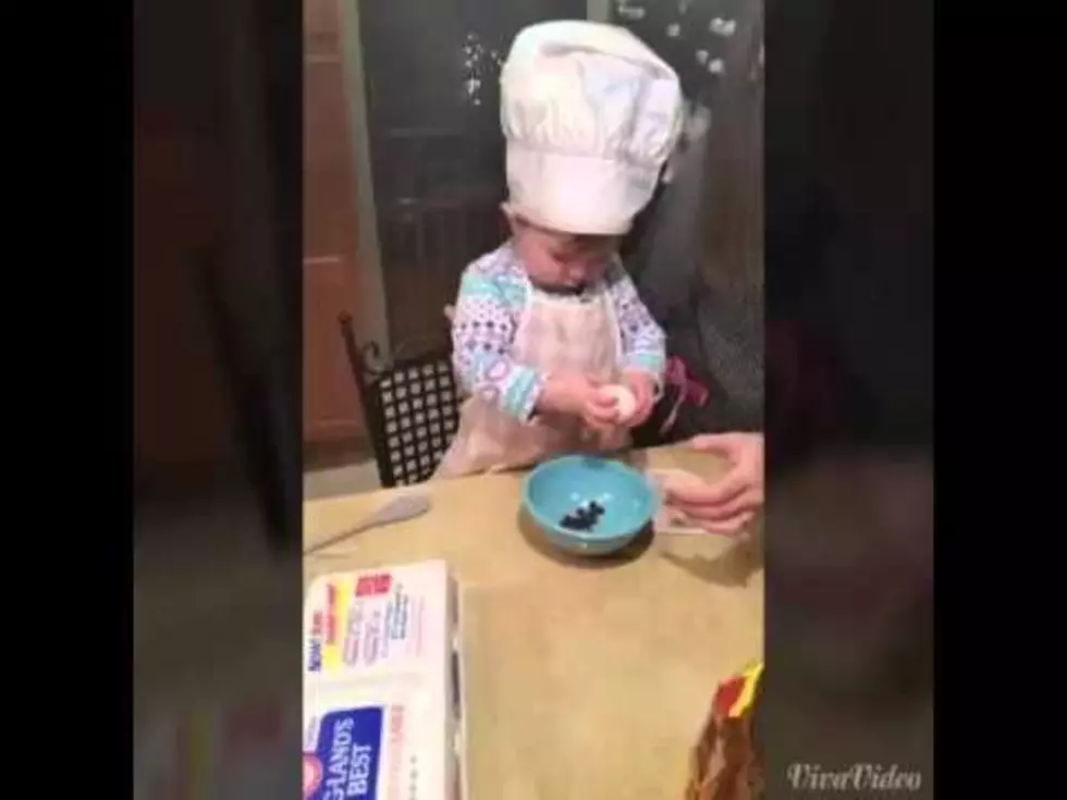 Child Cracks Her First Egg Like She Was Born to do it.