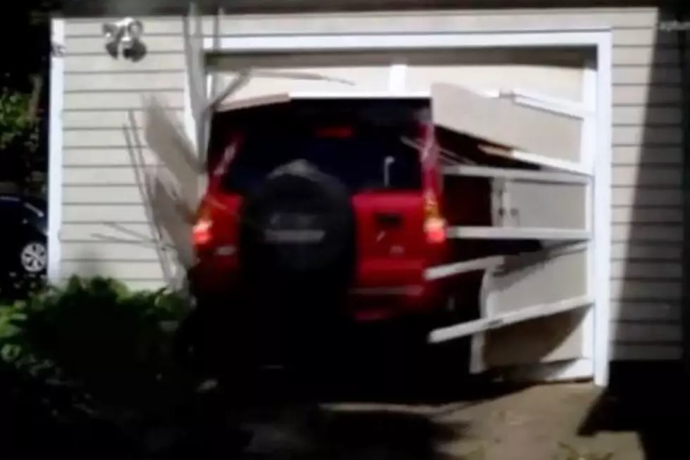Ninety Year Old Gets His Wish to Drive Through a Garage Door