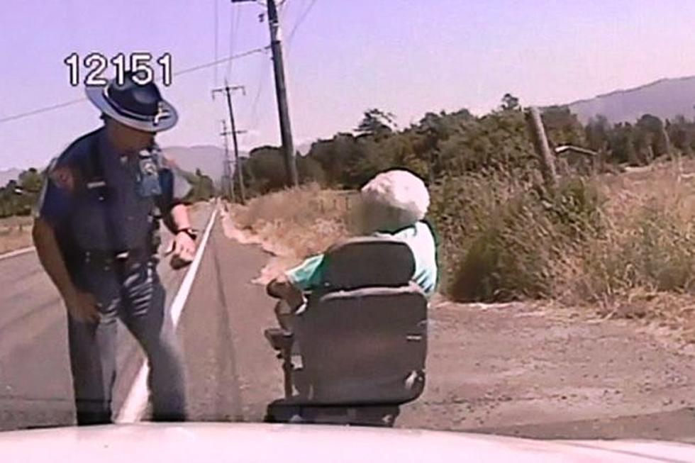 Police Escort a Little Ole Lady and Her Scooter