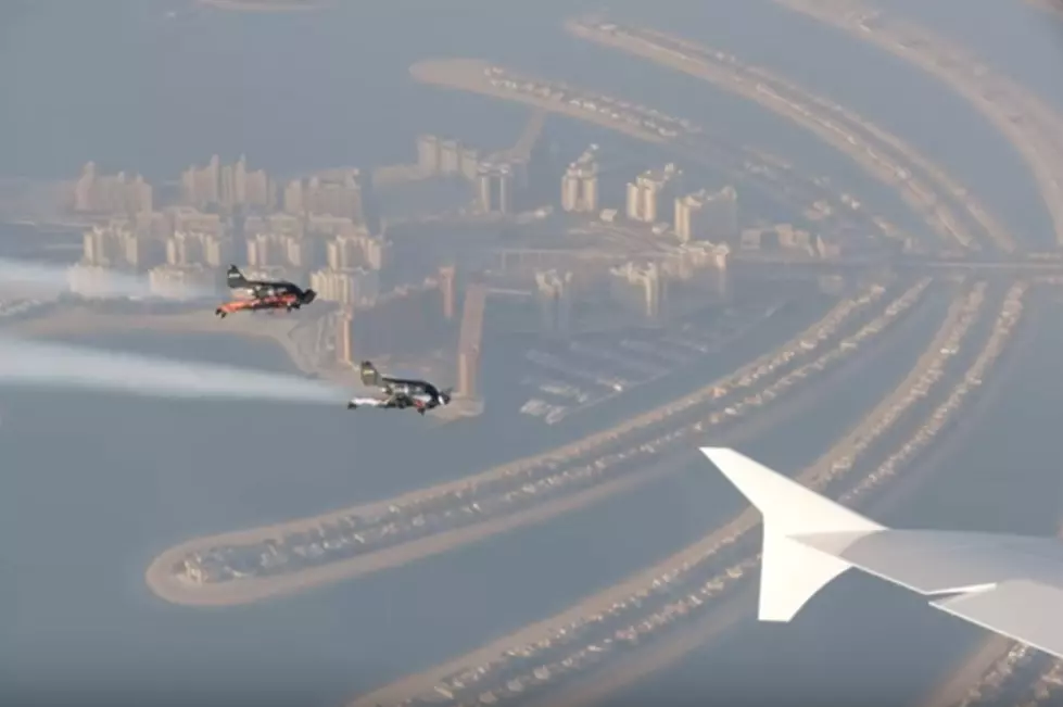 A Man Flying Along Side a Emirates Airbus A380 is Real