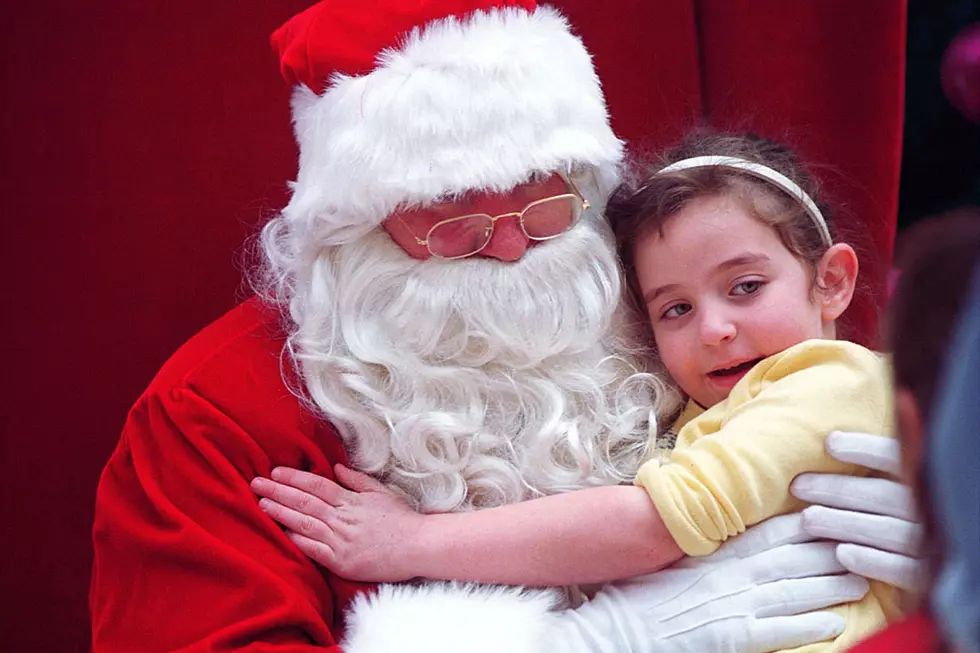 Precious Baby Sleeping on Santa Is What Makes Christmas Great