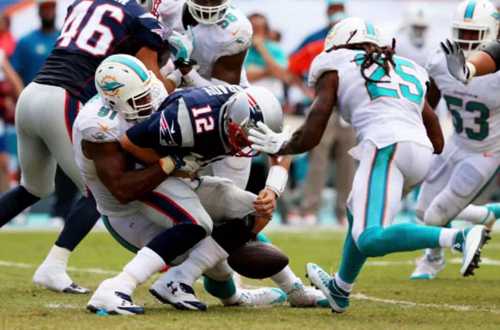 Moreno And Miami Defense Leads Dolphins Over Patriots 33-20