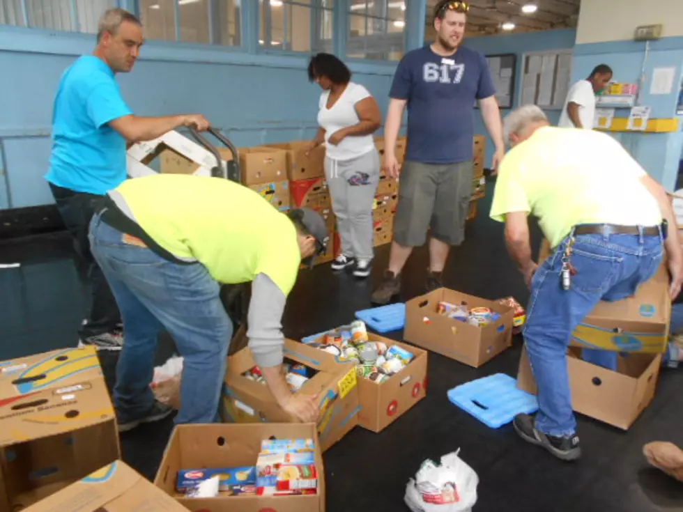 Local Residents And Letter Carriers Help Restock Food Pantries