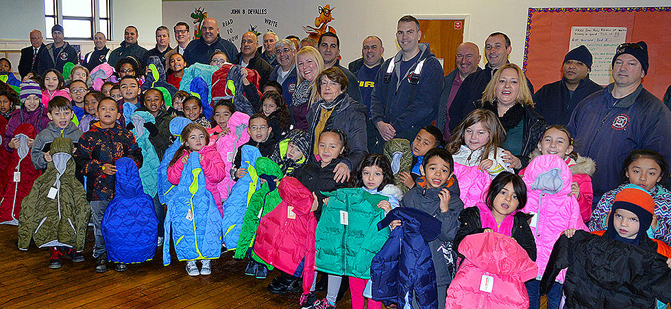 NBFD Delivers 100 Winter Coats To New Bedford Public Schools
