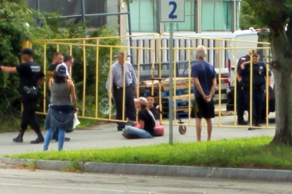 Protestors Chained to Gates of Bristol County Jail Arrested