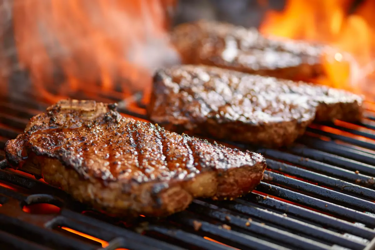 Grilled cube steaks stock photo. Image of grill, skillet 129242672