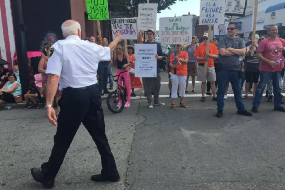 Sheriff Hodgson Faces Protestors While Walking in Feast Parade 