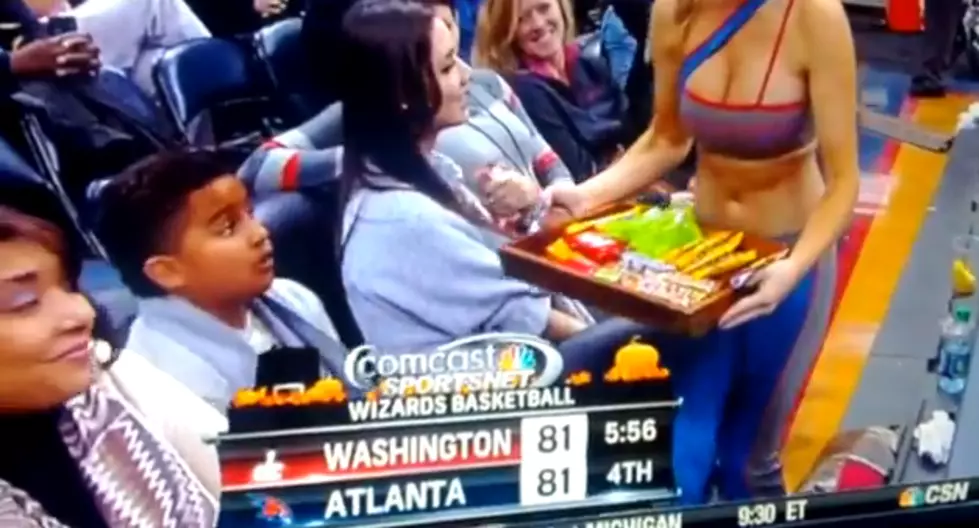 Young Basketball Fan Stares At Cheerleader’s Chest [VIDEO]