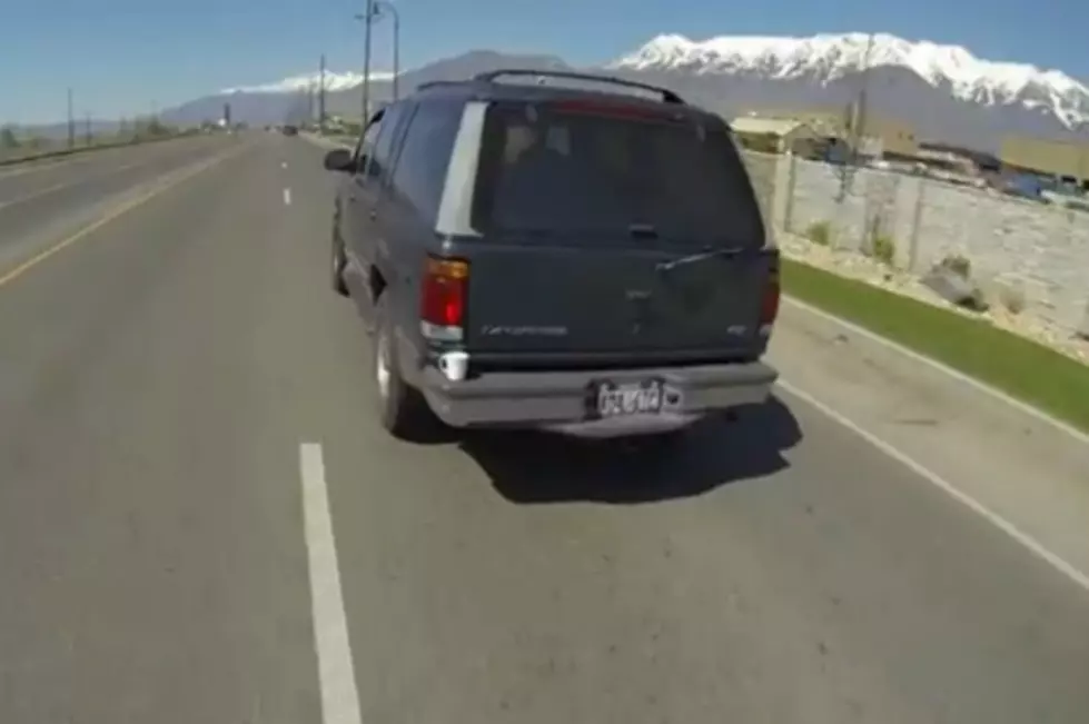 Motorcyclist Saves Coffee Cup Left On Back Bumper [VIDEO]