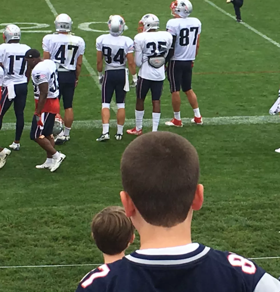 Patriots Training Camp:  Matthew Rock Throws Tom Brady A Pass
