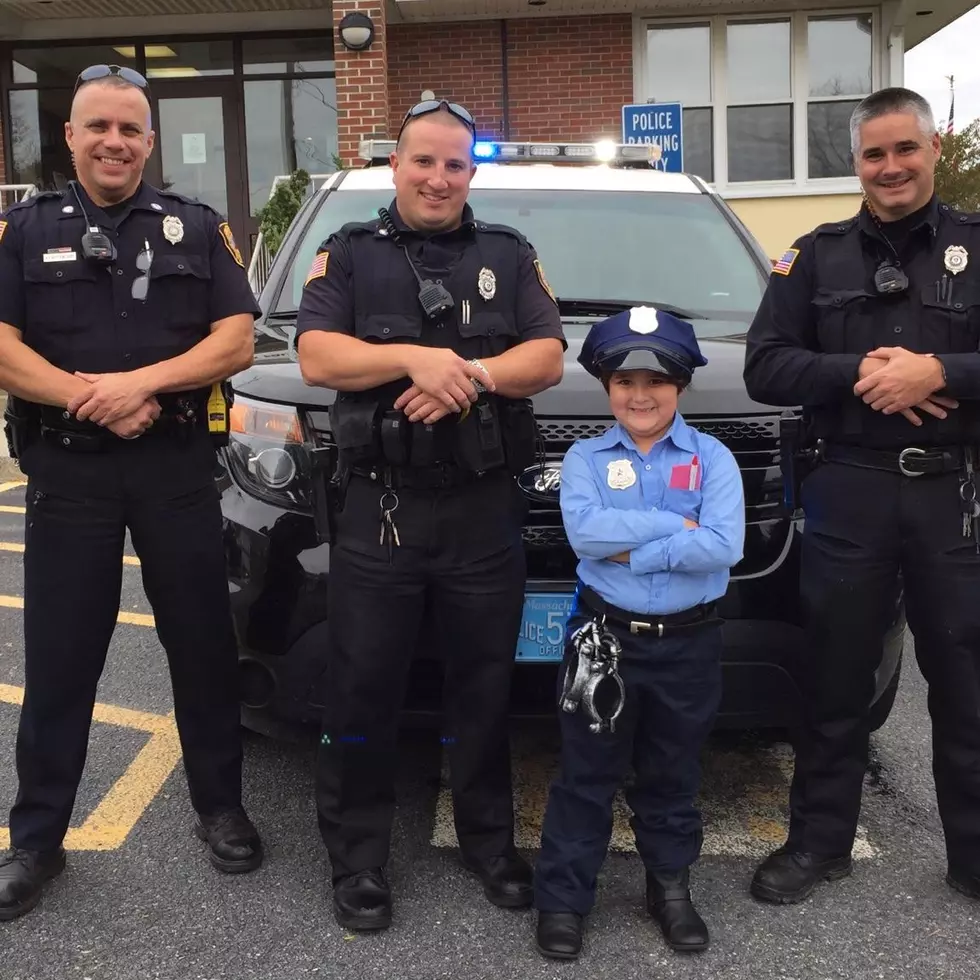 Young Girl Hopes to Trade Police Officer Costume for Uniform When She Grows Up