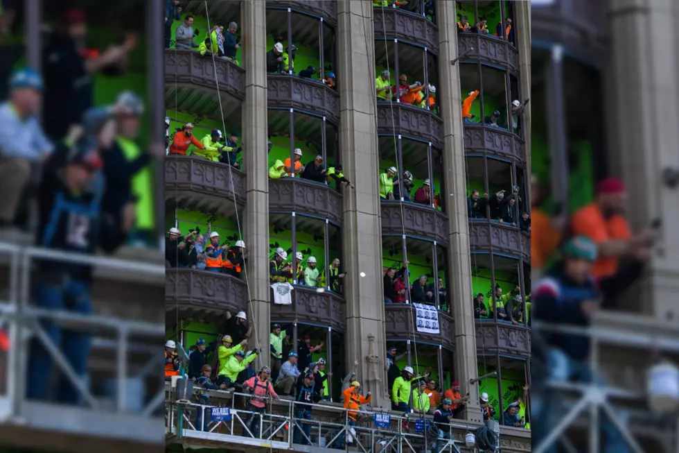 Anonymous Man Sneaks onto Construction Scaffold at Patriots Parade [VIDEO]