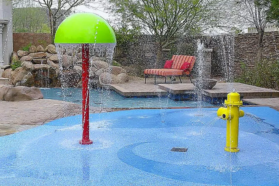 Should You Be Getting a Backyard Splash Pad Instead of a Pool?