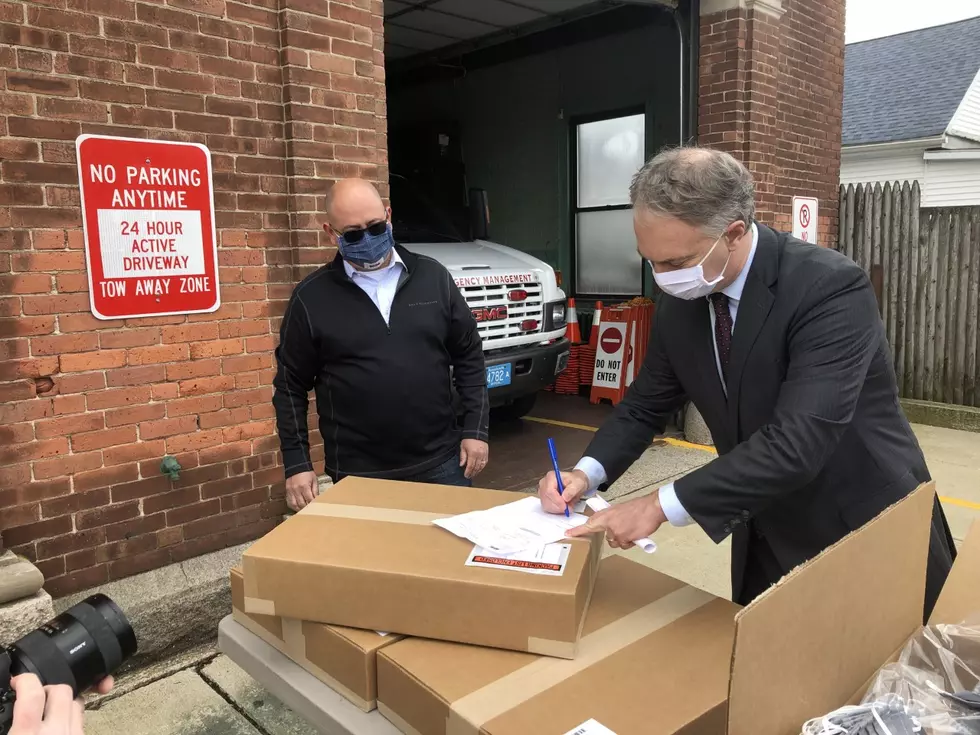 New Bedford Distributing 50,000 Joseph Abboud Masks