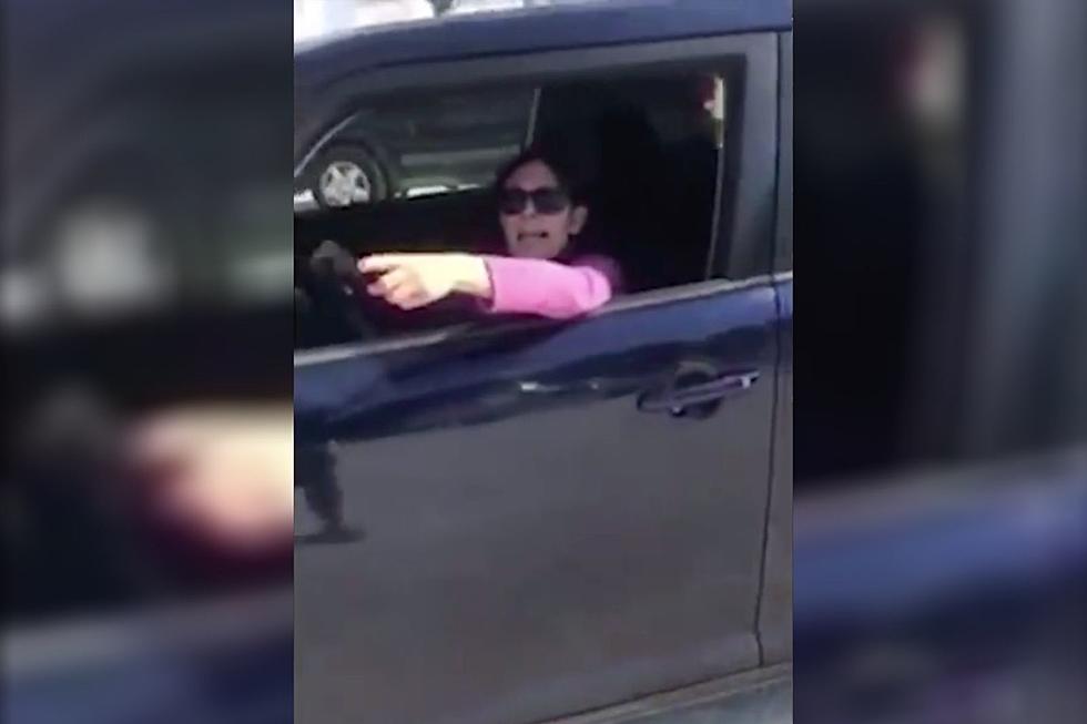 Enraged Rhode Island Woman Threatens Two Men in Truck [VIDEO]