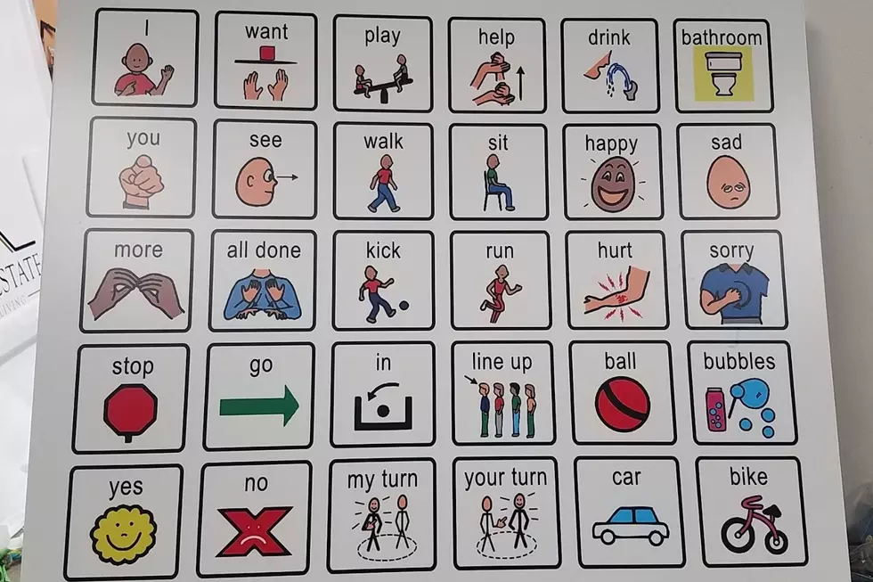 Local Preschool Teacher Installs Communication Sign on Playground