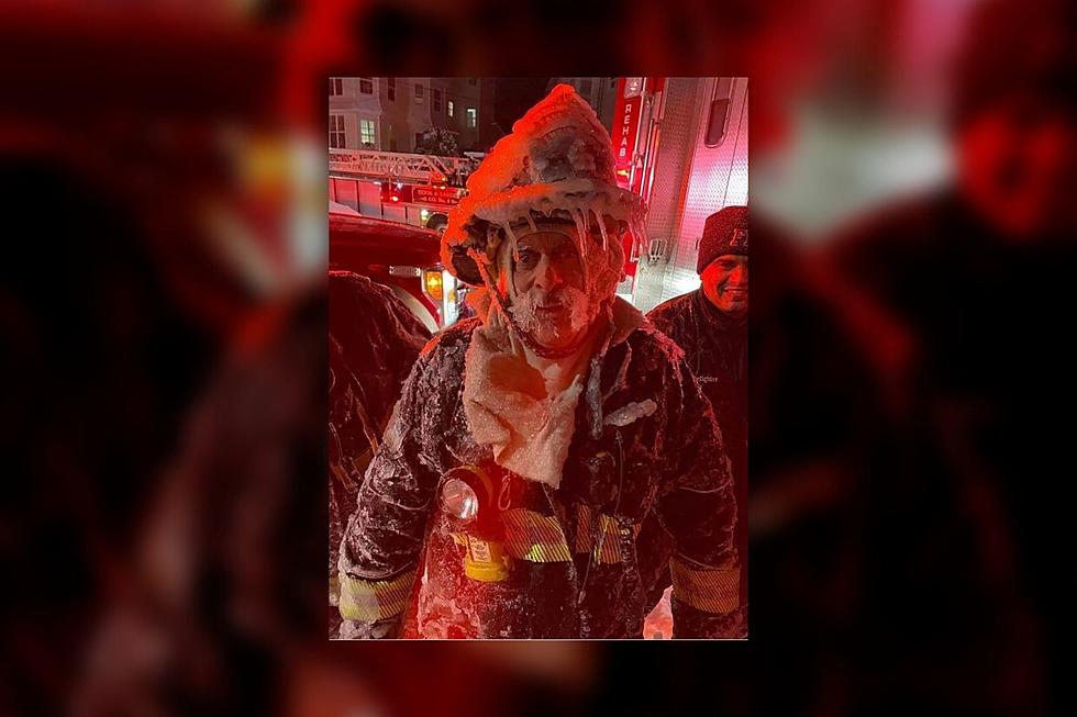 The True Story Behind This Viral Photo of a Frozen Fall River Firefighter