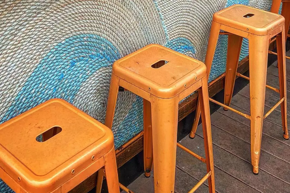 These Weird Barstool Holes Have a Purpose and It Makes Perfect Sense