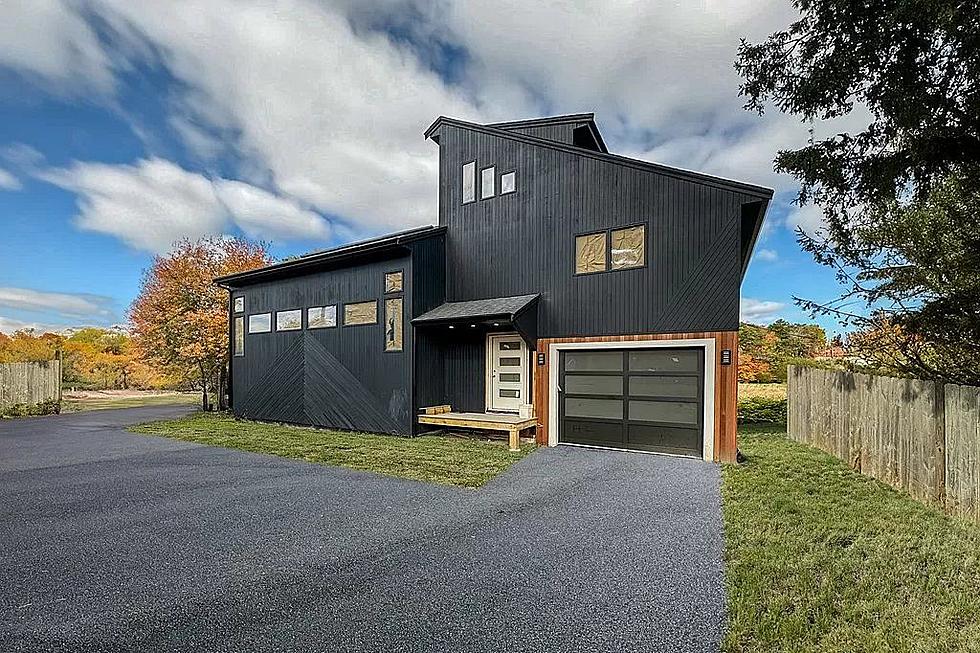 'Chateau-Inspired' Dartmouth Home Is a Riverside Stunner