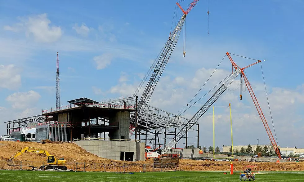 Worker dies at Broncos facility; construction halted