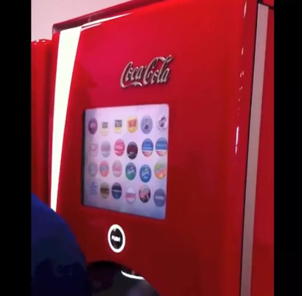 Drillers QB Chris Ware Operates A New Touchscreen Soft-Drink Vending Machine