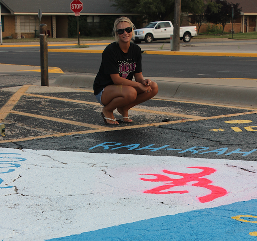 The Annual Tradition Of High School Seniors Painting Their Parking Spaces Begins