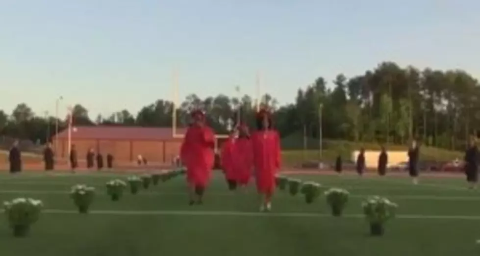 Girl Falls Walking In Heels At Her Graduation [Video]